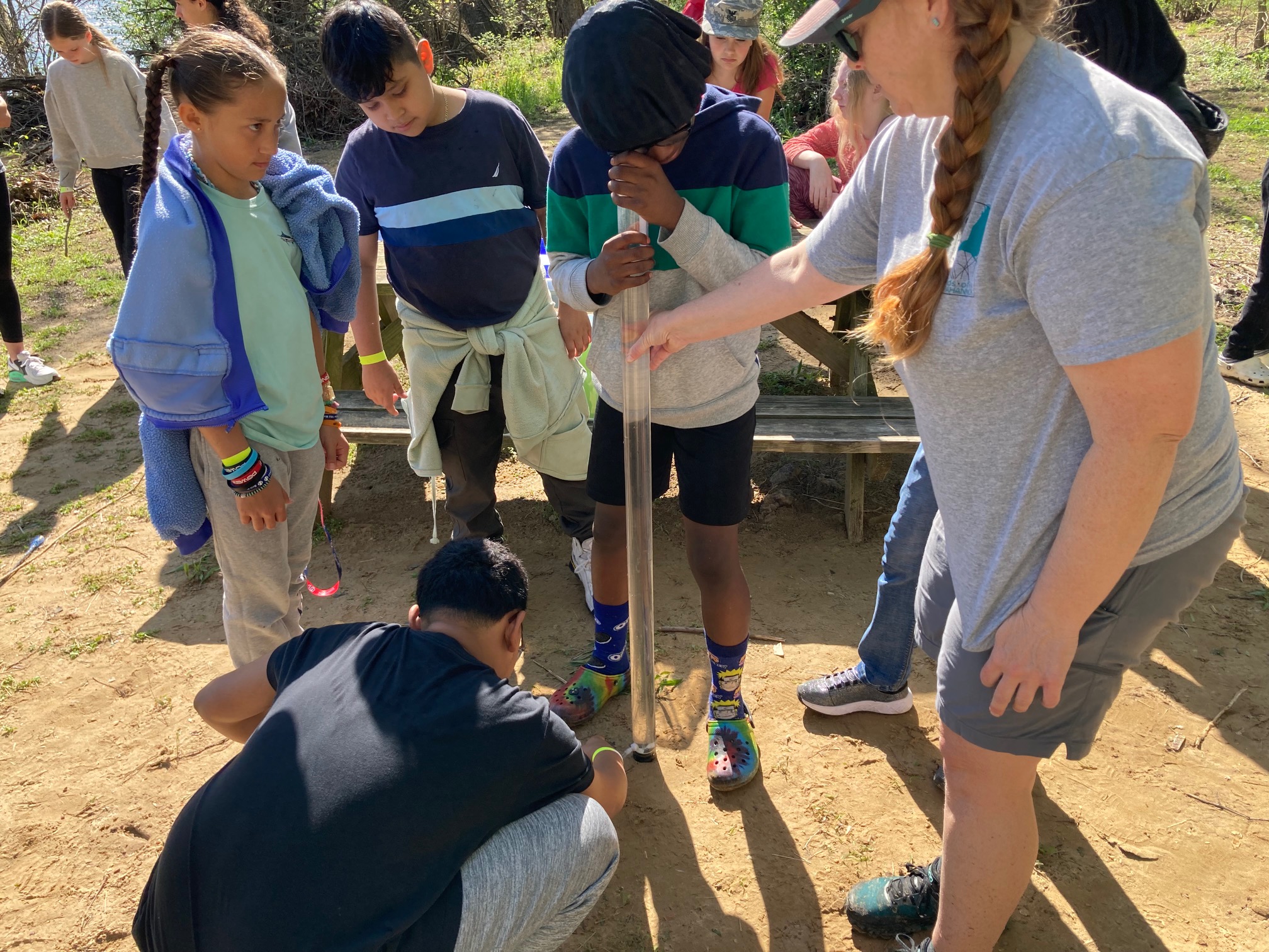 6th grade students at Walker-Grant Middle School measure the turbidity of the Rappahannock River during an field trip on April 16, 2024. Photo by Adele Uphaus.